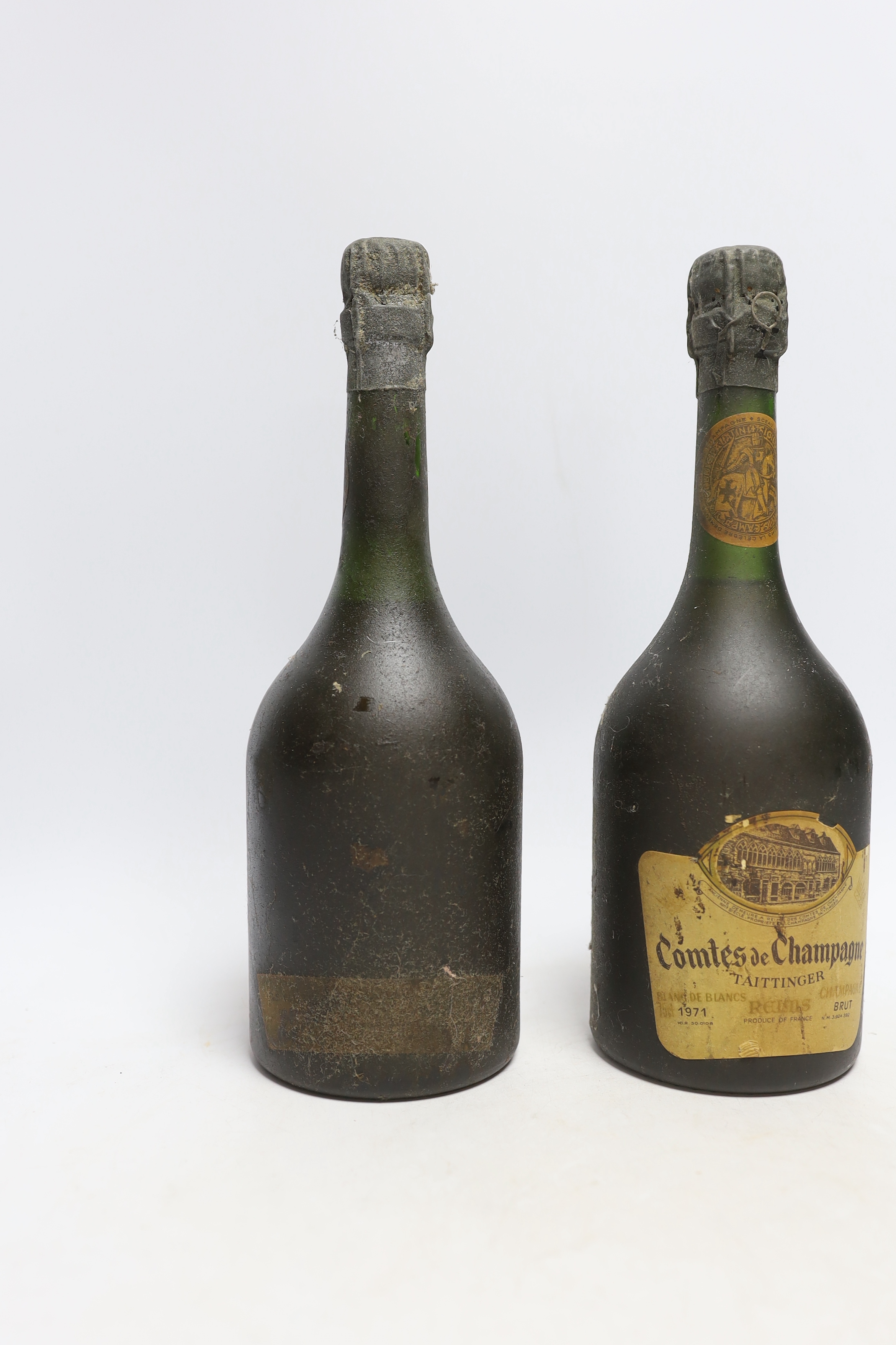 Two bottles of 1971 Taittinger champagne